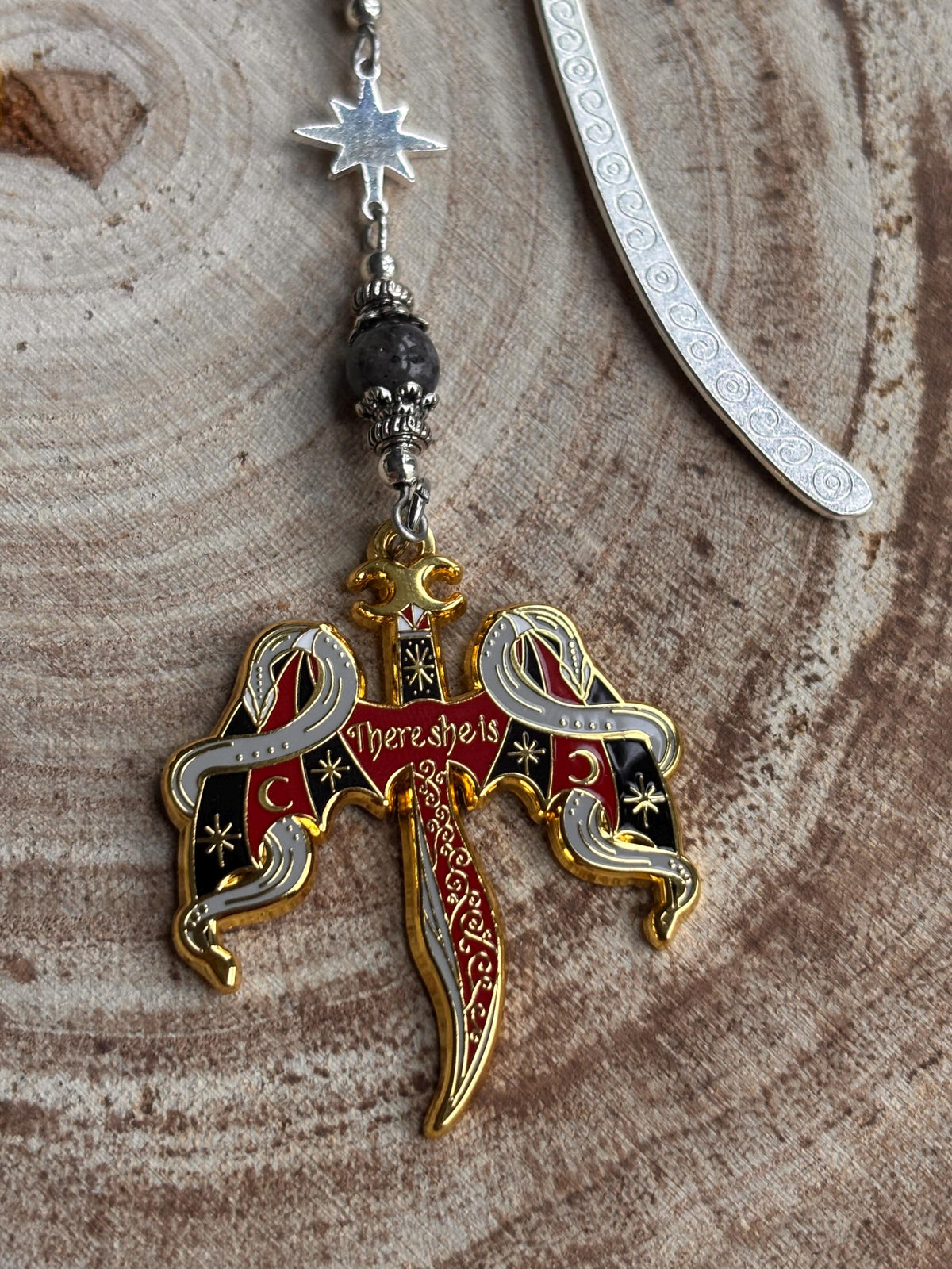 Crowns of Nyaxia Bookmark or Keychain. There she is - officially licensed Merch by Carissa Broadbent