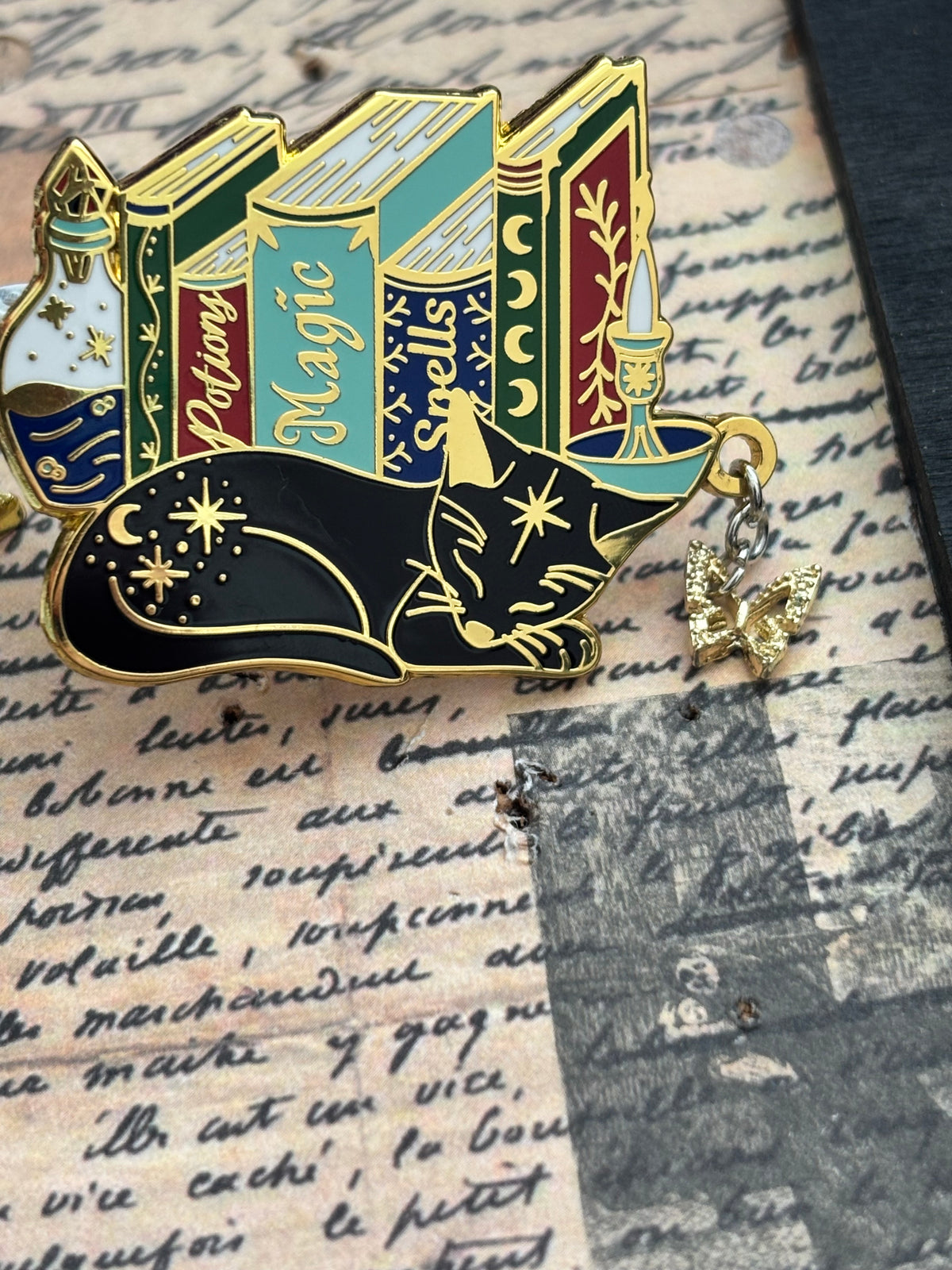 Cat Bookstack Magic Collection. Cat Pin. Enamel witchy book cat lover merch. Cat dreaming of butterflies.