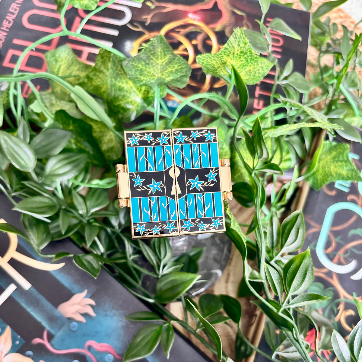 The Prison Healer Officially Licensed Pin Badge - Lynette Noni. Interactive pin badge in hard enamel.