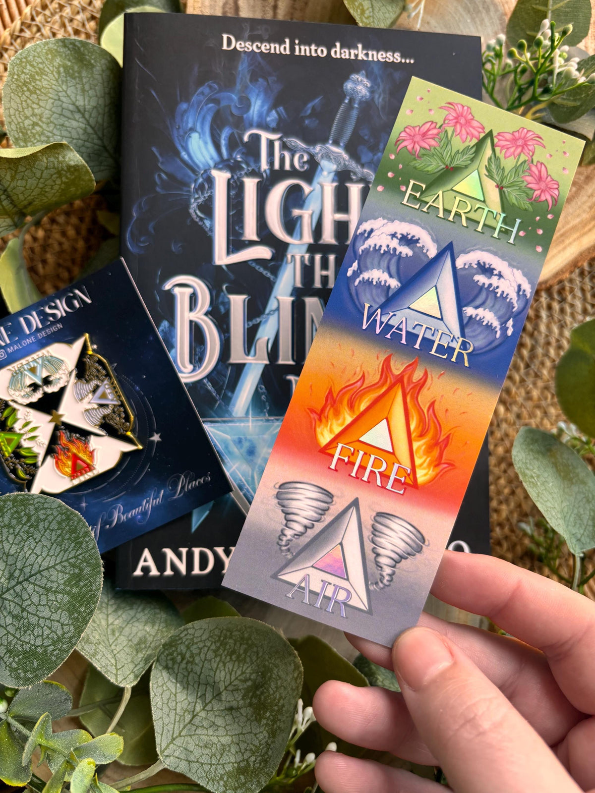 Elemental Foil bookmark and Pin Badge. Earth, Water, fire and Air. Andy Darcy Theo. The Light That Blinds Us Official Merch.