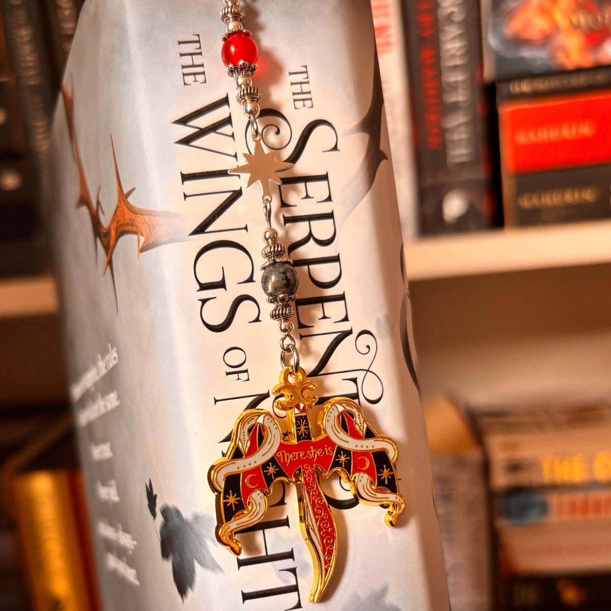 Crowns of Nyaxia Bookmark or Keychain. There she is - officially licensed Merch by Carissa Broadbent