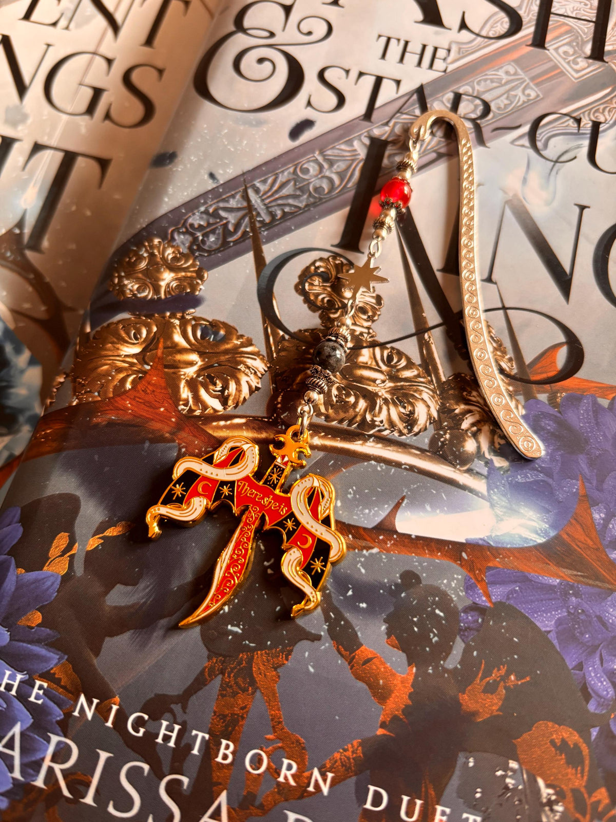 Crowns of Nyaxia Bookmark or Keychain. There she is - officially licensed Merch by Carissa Broadbent