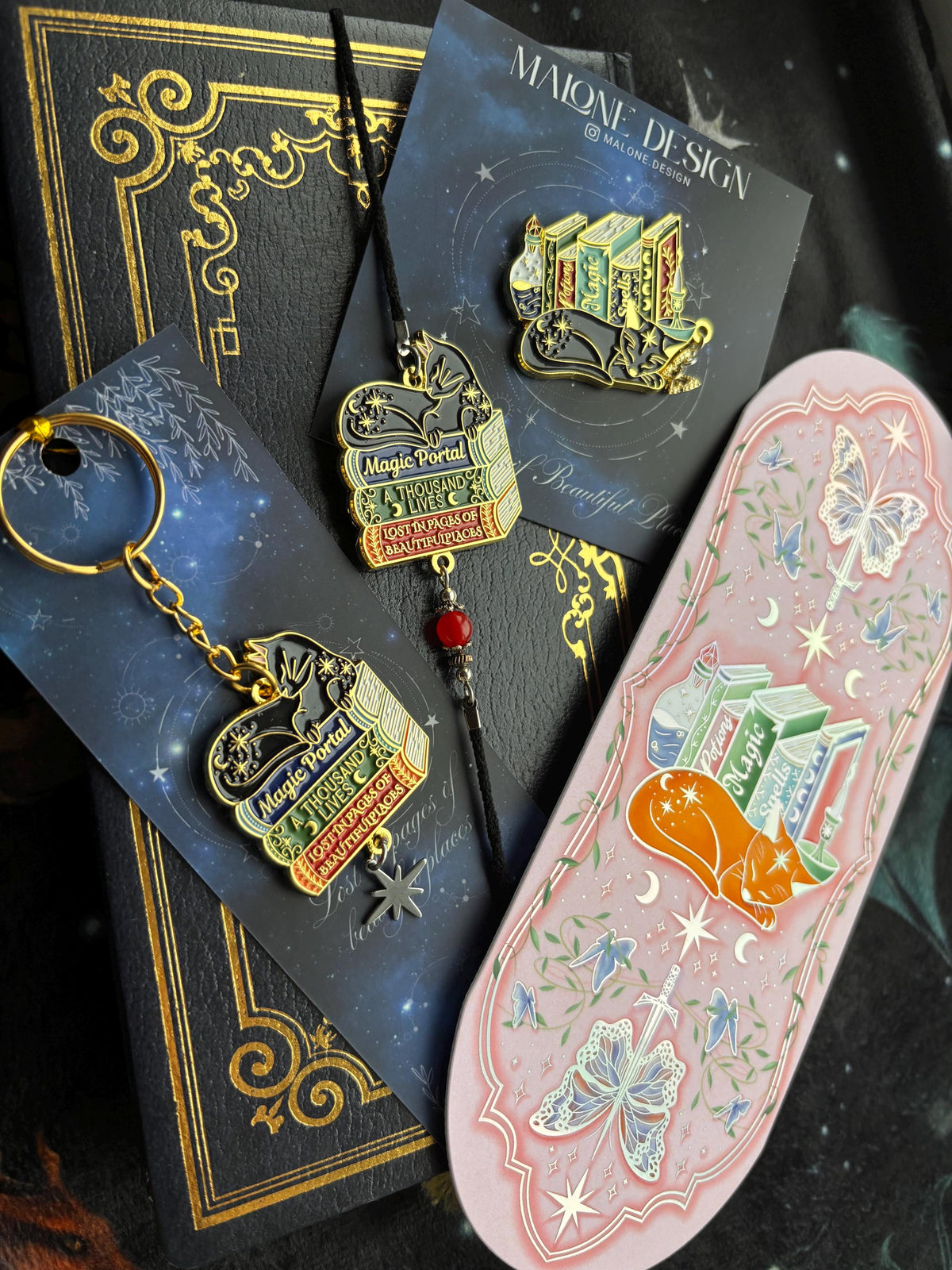 Cat Bookstack Magic Collection Bookmark. Pink holographic foiled bookmark with ginger cat.